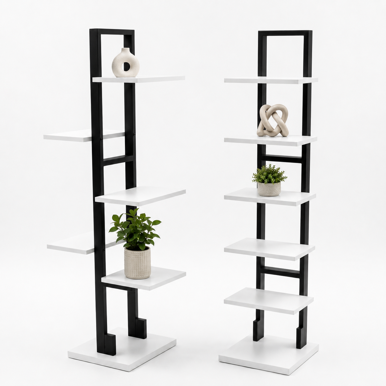 Two black and white bookshelves with decorative items on a white background